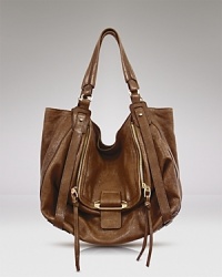 With a tough-luxe mix of soft leather and shiny zippers and a slouchy shape, Kooba's shoulder bag elevates casual style to chic new heights. With a tough-luxe mix of soft leather and shiny zippers and a slouchy shape, Kooba's shoulder bag elevates casual style to chic new heights.