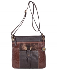 Keep things casual with this around-town crossbody from The Sak. Heavy stitching, antique brass-tone hardware and conveniently placed pockets add style to this functional design. Keep things casual with this around-town crossbody from The Sak. Heavy stitching, antique brass-tone hardware and conveniently placed pockets add style to this functional design.
