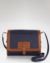 Nail this season's mini bag trend with this coated canvas crossbody from Tory Burch. In a primary palette with polished trims, it's a small scale statement piece. Nail this season's mini bag trend with this coated canvas crossbody from Tory Burch. In a primary palette with polished trims, it's a small scale statement piece.