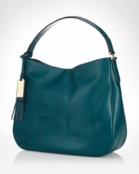 Silly-smooth leather covers a slouchy, effortless Lauren Ralph Lauren handbag. A simple shoulder strap arcs over a center snap closure, and the roomy interior has 3 pockets. Silly-smooth leather covers a slouchy, effortless Lauren Ralph Lauren handbag. A simple shoulder strap arcs over a center snap closure, and the roomy interior has 3 pockets.
