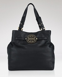 A bold signature logo brands this textured leather tote with classic style. By Tory Burch. A bold signature logo brands this textured leather tote with classic style. By Tory Burch.