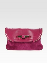 Rich textured suede is mixed with shiny leather and polished hardware on this notice-me design. Push-lock flap closureOne outside open pocketOne inside open pocketCanvas lining12W X 8H X 1DMade in Italy Rich textured suede is mixed with shiny leather and polished hardware on this notice-me design. Push-lock flap closureOne outside open pocketOne inside open pocketCanvas lining12W X 8H X 1DMade in Italy