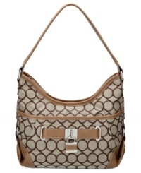 Although detailed with a classic 9 signature print, this Nine West style is a definite 10. Ideal for both work and play, this classic hobo silhouette is detailed with silvertone hardware and contrast trim. Although detailed with a classic 9 signature print, this Nine West style is a definite 10. Ideal for both work and play, this classic hobo silhouette is detailed with silvertone hardware and contrast trim.