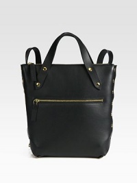 A modern and avant-garde brand with beautifully-crafted pieces such as this luxurious leather design with edgy rivets in a sleek and minimalist style.Top handlesAdjustable shoulder strapsTop zip closureOutside pocketsInside pocketsFully lined9W X 11¾H X 3DMade in Italy A modern and avant-garde brand with beautifully-crafted pieces such as this luxurious leather design with edgy rivets in a sleek and minimalist style.Top handlesAdjustable shoulder strapsTop zip closureOutside pocketsInside pocketsFully lined9W X 11¾H X 3DMade in Italy