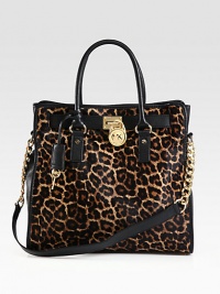 Luxurious, animal print calf hair and supple, contrast leather come together in an elegant design accented with radiant hardware.Double leather top handles, 5 dropChain and leather shoulder strap, 12 dropMagnetic snap closureProtective metal feetOne inside zip pocketFour inside open pocketsFully lined14½W X 13H X 6DImported Luxurious, animal print calf hair and supple, contrast leather come together in an elegant design accented with radiant hardware.Double leather top handles, 5 dropChain and leather shoulder strap, 12 dropMagnetic snap closureProtective metal feetOne inside zip pocketFour inside open pocketsFully lined14½W X 13H X 6DImported