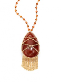 THE LOOKPendant designWire-wrapped orange rutilated quartz and carnelian accents Tassel details on pendant19 tcw14k goldfilled settingTHE MEASUREMENTPendant drop, about 2½Length, about 19ORIGINImported THE LOOKPendant designWire-wrapped orange rutilated quartz and carnelian accents Tassel details on pendant19 tcw14k goldfilled settingTHE MEASUREMENTPendant drop, about 2½Length, about 19ORIGINImported