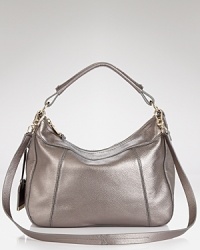 Cole Haan gives it's signature hobo a cool update. Crafted from leather and perfectly proportioned for busy days, it's a shining example of practical style. Cole Haan gives it's signature hobo a cool update. Crafted from leather and perfectly proportioned for busy days, it's a shining example of practical style.