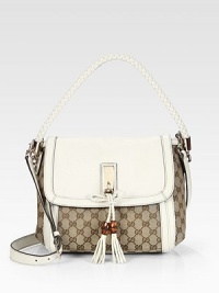 A multifunctional shoulder bag with charming details and a smart shape.Beige/ebony original GG canvasLeather trimLight fine gold hardwareDouble woven leather handles, 6 dropAdjustable and detachable shoulder strap, 21 dropWoven leather bow, GG charm A multifunctional shoulder bag with charming details and a smart shape.Beige/ebony original GG canvasLeather trimLight fine gold hardwareDouble woven leather handles, 6 dropAdjustable and detachable shoulder strap, 21 dropWoven leather bow, GG charm