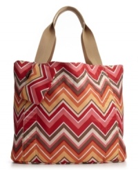 Change your mind without changing your handbag. This eye-catching Frank Sarto tote can be easily reversed for a different design anytime you get the urge to change things up. Change your mind without changing your handbag. This eye-catching Frank Sarto tote can be easily reversed for a different design anytime you get the urge to change things up.