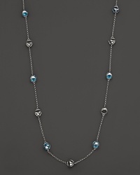 This bold sterling silver lstation necklace gleaming with blue quartz, is a brilliant showcase for Di MODOLO's iconic Triadra design. This bold sterling silver lstation necklace gleaming with blue quartz, is a brilliant showcase for Di MODOLO's iconic Triadra design.