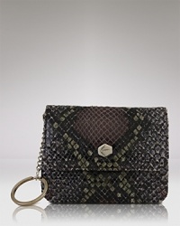 Get your case on point with this exotically embossed style from Lodis Accessories, featuring a detachable key chain and zip closure pocket. Get your case on point with this exotically embossed style from Lodis Accessories, featuring a detachable key chain and zip closure pocket.