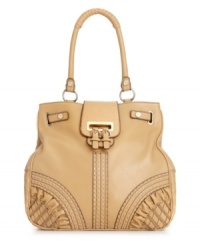 This unique style from Jessica Simpson is guaranteed to turn a few heads. Heavy stitching, rouched detailing and shiny gold-tone accents add polished appeal to this classic tote design. This unique style from Jessica Simpson is guaranteed to turn a few heads. Heavy stitching, rouched detailing and shiny gold-tone accents add polished appeal to this classic tote design.