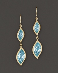 Pavé diamonds frame faceted blue topaz, set in 18K gold leaves. By Carelle. Pavé diamonds frame faceted blue topaz, set in 18K gold leaves. By Carelle.