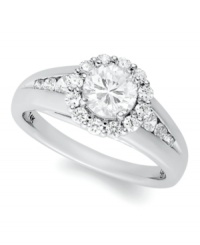 Make the moment even more magical. This beautiful engagement ring features a large, certified, round-cut diamond at center surrounded by an exquisite halo of smaller diamonds and diamonds at the shoulders (1-1/4 ct. t.w.). Crafted in 14k white gold.