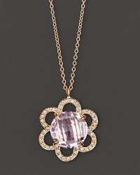 Pavé diamonds blossom around a 18K gold flower, centered with faceted rose of France. By Carelle. Pavé diamonds blossom around a 18K gold flower, centered with faceted rose of France. By Carelle.