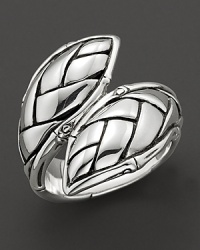 A bamboo leaf, delicately rendered in sterling silver, dramatically circles your finger. A bamboo leaf, delicately rendered in sterling silver, dramatically circles your finger.