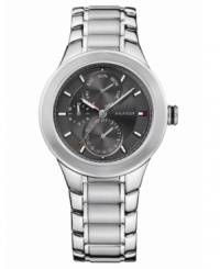 A sophisticated watch that goes from the office to the track in even speed, by Tommy Hilfiger. Silvertone stainless steel bracelet with round case. Round gray dial with three subdials, logo and stick indices. Quartz movement. Water resistant to 50 meters. Ten-year limited warranty. A sophisticated watch that goes from the office to the track in even speed, by Tommy Hilfiger. Silvertone stainless steel bracelet with round case. Round gray dial with three subdials, logo and stick indices. Quartz movement. Water resistant to 50 meters. Ten-year limited warranty.