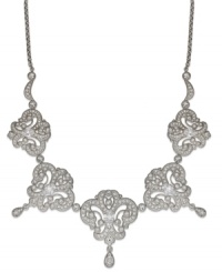 Be enraptured with Eliot Danori's elegant frontal necklace. Five ornate pendants shine with crystal accents and cubic zirconia stones (2-9/10 ct. t.w.). Crafted in silver tone rhodium-plated mixed metal. Approximate length: 16 inches + 2-inch extender. Approximate drop: 1/4 inch. Be enraptured with Eliot Danori's elegant frontal necklace. Five ornate pendants shine with crystal accents and cubic zirconia stones (2-9/10 ct. t.w.). Crafted in silver tone rhodium-plated mixed metal. Approximate length: 16 inches + 2-inch extender. Approximate drop: 1/4 inch.