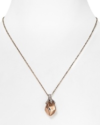 A coolly plated claw grabs for a faceted rose gold stone on this House of Harlow 1960 necklace, finished in a simply styled palladium plated chain. A coolly plated claw grabs for a faceted rose gold stone on this House of Harlow 1960 necklace, finished in a simply styled palladium plated chain.