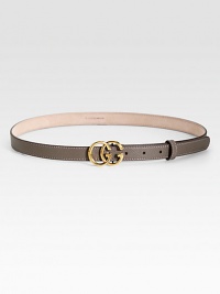 Thin leather strip adorned with double G buckle and shiny antique brass hardware.Contrast stitching About ¾ wide Leather Made in Italy Thin leather strip adorned with double G buckle and shiny antique brass hardware.Contrast stitching About ¾ wide Leather Made in Italy