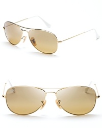 The mirrored crystal brown lenses and white ear pieces of these updated Ray-Ban aviators give you reason to add a second (or third) pair to your collection. The mirrored crystal brown lenses and white ear pieces of these updated Ray-Ban aviators give you reason to add a second (or third) pair to your collection.