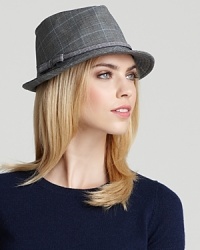 Stay mad for preppy plaid with this trend-right August Accessories fedora. A pink houndstooth ribbon adds spark. Stay mad for preppy plaid with this trend-right August Accessories fedora. A pink houndstooth ribbon adds spark.