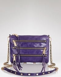 Go downtown with this Rebecca Minkoff crossbody. This bag's shape is endlessly versatile, while an edgy array of zippers goes from the subway to the it nightspot. Go downtown with this Rebecca Minkoff crossbody. This bag's shape is endlessly versatile, while an edgy array of zippers goes from the subway to the it nightspot.