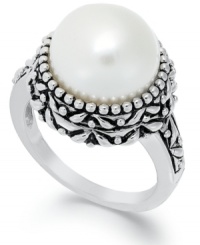 Dedicated to elegance. This beautiful cultured freshwater pearl ring (11-1/2-12mm) sits in an intricately-engraved sterling silver setting. Size 7. Dedicated to elegance. This beautiful cultured freshwater pearl ring (11-1/2-12mm) sits in an intricately-engraved sterling silver setting. Size 7.