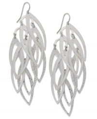 Autumn-inspired earrings, by Style&co. This drop design shimmers and shakes with leaf pendants with textured detail. Crafted in silver tone mixed metal. Approximate drop: 3-1/2 inches. Autumn-inspired earrings, by Style&co. This drop design shimmers and shakes with leaf pendants with textured detail. Crafted in silver tone mixed metal. Approximate drop: 3-1/2 inches.
