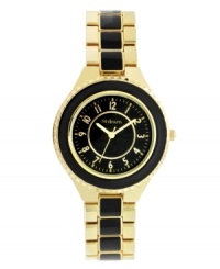 Decadent design for everyday elegance. Watch by Style&co. crafted of black and gold tone mixed metal bracelet and round gold tone case with black bezel. Glossy black dial features applied gold tone numerals, minute track, three hands and logo. Quartz movement. Splash resistant. Two-year limited warranty. Decadent design for everyday elegance. Watch by Style&co. crafted of black and gold tone mixed metal bracelet and round gold tone case with black bezel. Glossy black dial features applied gold tone numerals, minute track, three hands and logo. Quartz movement. Splash resistant. Two-year limited warranty.