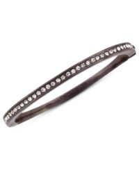 Sleek and stunning. Vince Camuto's thin bangle bracelet is crafted from chocolate-tone mixed metal with a dazzling array of glass crystal accents for a fashion infusion. Approximate diameter: 3-1/2 inches. Sleek and stunning. Vince Camuto's thin bangle bracelet is crafted from chocolate-tone mixed metal with a dazzling array of glass crystal accents for a fashion infusion. Approximate diameter: 3-1/2 inches.