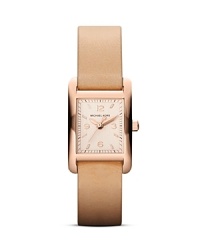 A coolly understated choice: this Michael Kors watch is defined by its rose gold plated case and matching dial, finished by a tonal leather strap. A coolly understated choice: this Michael Kors watch is defined by its rose gold plated case and matching dial, finished by a tonal leather strap.