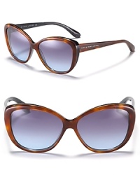 Retro-inspired frames meet modern colored lenses for a fun, chic look from MARC BY MARC JACOBS. Retro-inspired frames meet modern colored lenses for a fun, chic look from MARC BY MARC JACOBS.