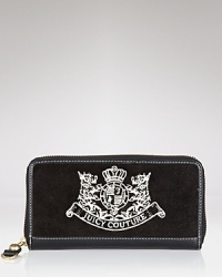 Soft velour, trimmed with leather, gets the royal treatment with a Juicy Couture crest. Soft velour, trimmed with leather, gets the royal treatment with a Juicy Couture crest.