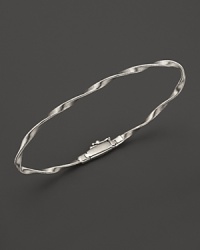 A gleaming twist of sterling silver, elegant alone or beautiful stacked. From the Marco Bicego Marrakech collection. A gleaming twist of sterling silver, elegant alone or beautiful stacked. From the Marco Bicego Marrakech collection.