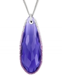 Purple plays a striking part in Swarovski's Pure pendant. Crafted from rhodium-plated mixed metal, a purple crystal both dangles and dazzles. Approximate drop: 1-3/5 inches. Purple plays a striking part in Swarovski's Pure pendant. Crafted from rhodium-plated mixed metal, a purple crystal both dangles and dazzles. Approximate drop: 1-3/5 inches.