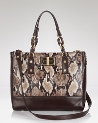 Milly gives the tried and true tote bag a rich update with python-embossed leather and gold-tone hardware. But don't let this carryall's luxe look fool you: it's roomy, pocket-trimmed interior perfects practical style. Milly gives the tried and true tote bag a rich update with python-embossed leather and gold-tone hardware. But don't let this carryall's luxe look fool you: it's roomy, pocket-trimmed interior perfects practical style.
