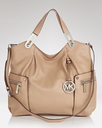 Highlight your daytime look with this large leather tote from MICHAEL Michael Kors. It's utterly effortless, simply slip your essentials inside for definitive daytime style. Highlight your daytime look with this large leather tote from MICHAEL Michael Kors. It's utterly effortless, simply slip your essentials inside for definitive daytime style.