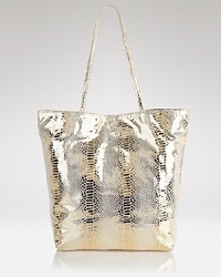 Carlos Falchi's signature tote is an exotic take on a classic shape. Microfiber with an interior pouch, this sleek style strikes an enviable balance between practicality and polish. Carlos Falchi's signature tote is an exotic take on a classic shape. Microfiber with an interior pouch, this sleek style strikes an enviable balance between practicality and polish.