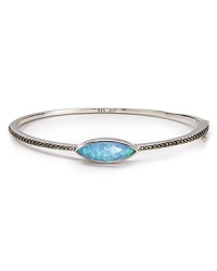 This striking bracelet from Judith Jack blends sterling silver and high color stones, creating an elegant adornment designed with evening drama in mind. This striking bracelet from Judith Jack blends sterling silver and high color stones, creating an elegant adornment designed with evening drama in mind.