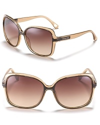 The simple and chic design of these oversized frames are pure MICHAEL Michael Kors. The simple and chic design of these oversized frames are pure MICHAEL Michael Kors.