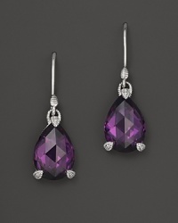 Pear-shaped purple crystal is set in sterling silver on these classic Judith Ripka earrings. Pear-shaped purple crystal is set in sterling silver on these classic Judith Ripka earrings.