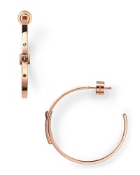 Simply designed and plated in high-shine metal, these Michael Kors earrings style every look with effortless luxury. Simply designed and plated in high-shine metal, these Michael Kors earrings style every look with effortless luxury.