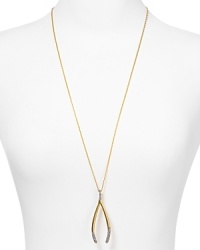 A clean geometric shape hangs delicately on this House of Harlow 1960 pendant necklace. Crafted from 14-karat yellow gold with black pave stones, this charm styles sweetness with an edge. A clean geometric shape hangs delicately on this House of Harlow 1960 pendant necklace. Crafted from 14-karat yellow gold with black pave stones, this charm styles sweetness with an edge.