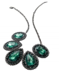 Soothing colors wash over this alluring station necklace from Style&co. The faceted green glass and plastic stones are complemented with dusky hematite hues. Crafted in hematite tone mixed metal. Approximate length: 19 inches + 2-inch extender. Approximate drop: 2 inches. Soothing colors wash over this alluring station necklace from Style&co. The faceted green glass and plastic stones are complemented with dusky hematite hues. Crafted in hematite tone mixed metal. Approximate length: 19 inches + 2-inch extender. Approximate drop: 2 inches.