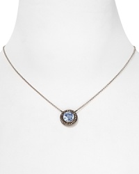 A striking blue stone highlights this Judith Jack pendant necklace, styled for elegant simplicity on a sterling silver chain. A striking blue stone highlights this Judith Jack pendant necklace, styled for elegant simplicity on a sterling silver chain.