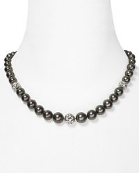 If every closet needs a little black dress, every jewelry box needs a timeless strand of pearls. This Majorica necklace features a crystal detail for a little something different. If every closet needs a little black dress, every jewelry box needs a timeless strand of pearls. This Majorica necklace features a crystal detail for a little something different.