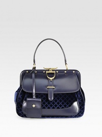 Black diamante velvet and black leatherDark blue diamante velvet and dark blue leatherBlack suede liningAntique gold hardwareTop handle with 5.5 dropHand covered leather frame closureStud detailSpur with engraved logoFront gusset pocketDetachable mini purse with snap closureInterior zip and open pocket with gold embossed crestProtective metal feetMedium size: 12.6W X 9.4H X 5.7DMade in Italy Black diamante velvet and black leatherDark blue diamante velvet and dark blue leatherBlack suede liningAntique gold hardwareTop handle with 5.5 dropHand covered leather frame closureStud detailSpur with engraved logoFront gusset pocketDetachable mini purse with snap closureInterior zip and open pocket with gold embossed crestProtective metal feetMedium size: 12.6W X 9.4H X 5.7DMade in Italy