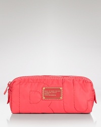 Styled in durable nylon, this MARC BY MARC JACOBS beauty bag is a pretty-practical cosmetic companion. Styled in durable nylon, this MARC BY MARC JACOBS beauty bag is a pretty-practical cosmetic companion.