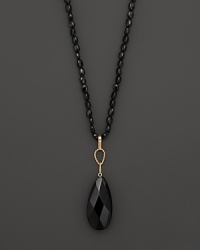 Onyx lentils add rich texture to 14K yellow gold. By Nancy B. Onyx lentils add rich texture to 14K yellow gold. By Nancy B.